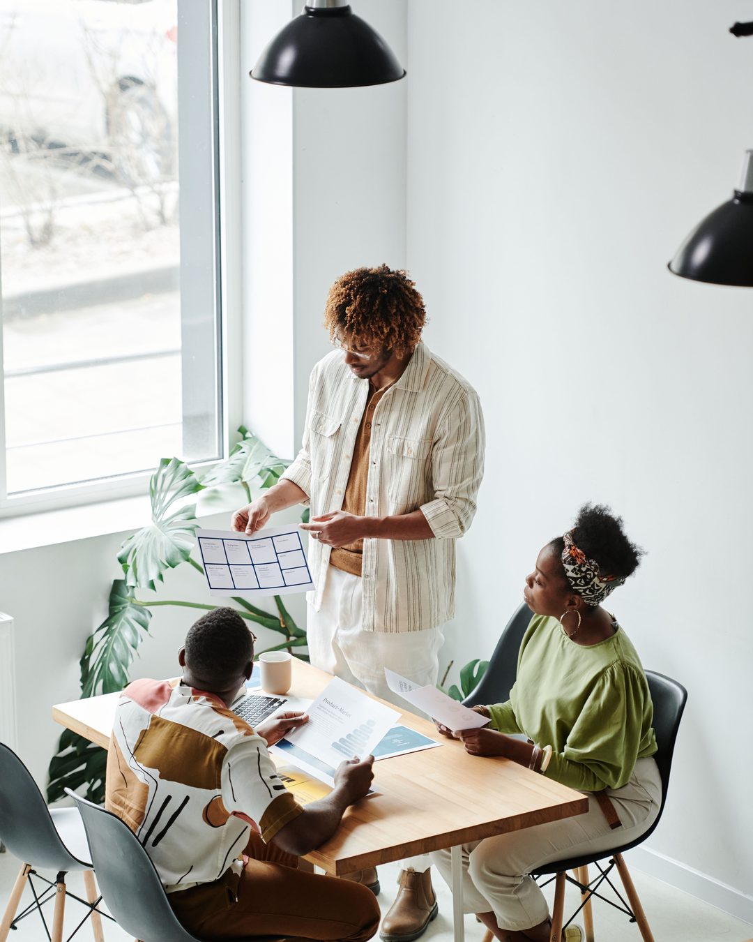 A founder and team mapping out a plan together